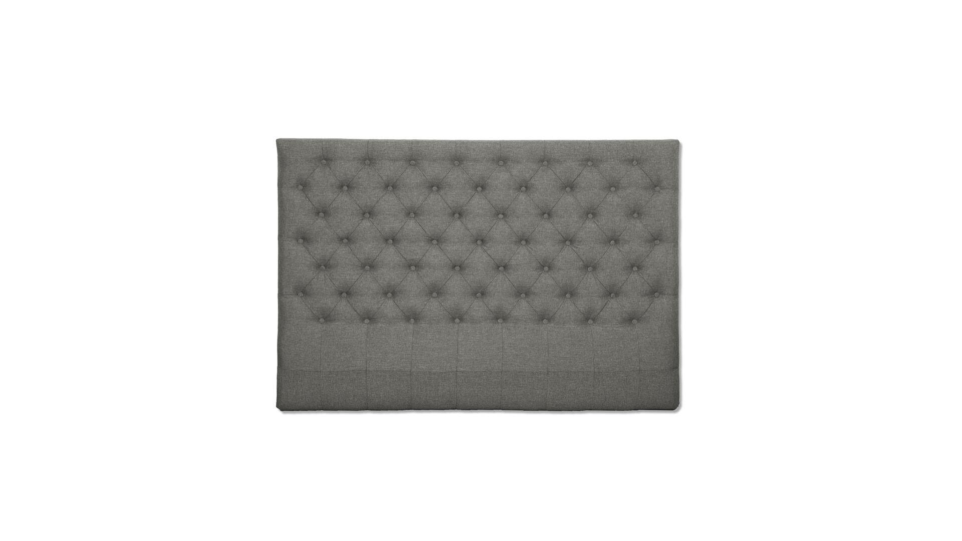 Beige knappet Chesterfield sengegavl fra Møbelringen i bredden 140 cm